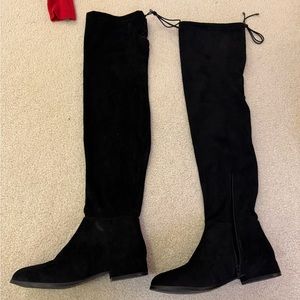 Black thing high over the knee boots